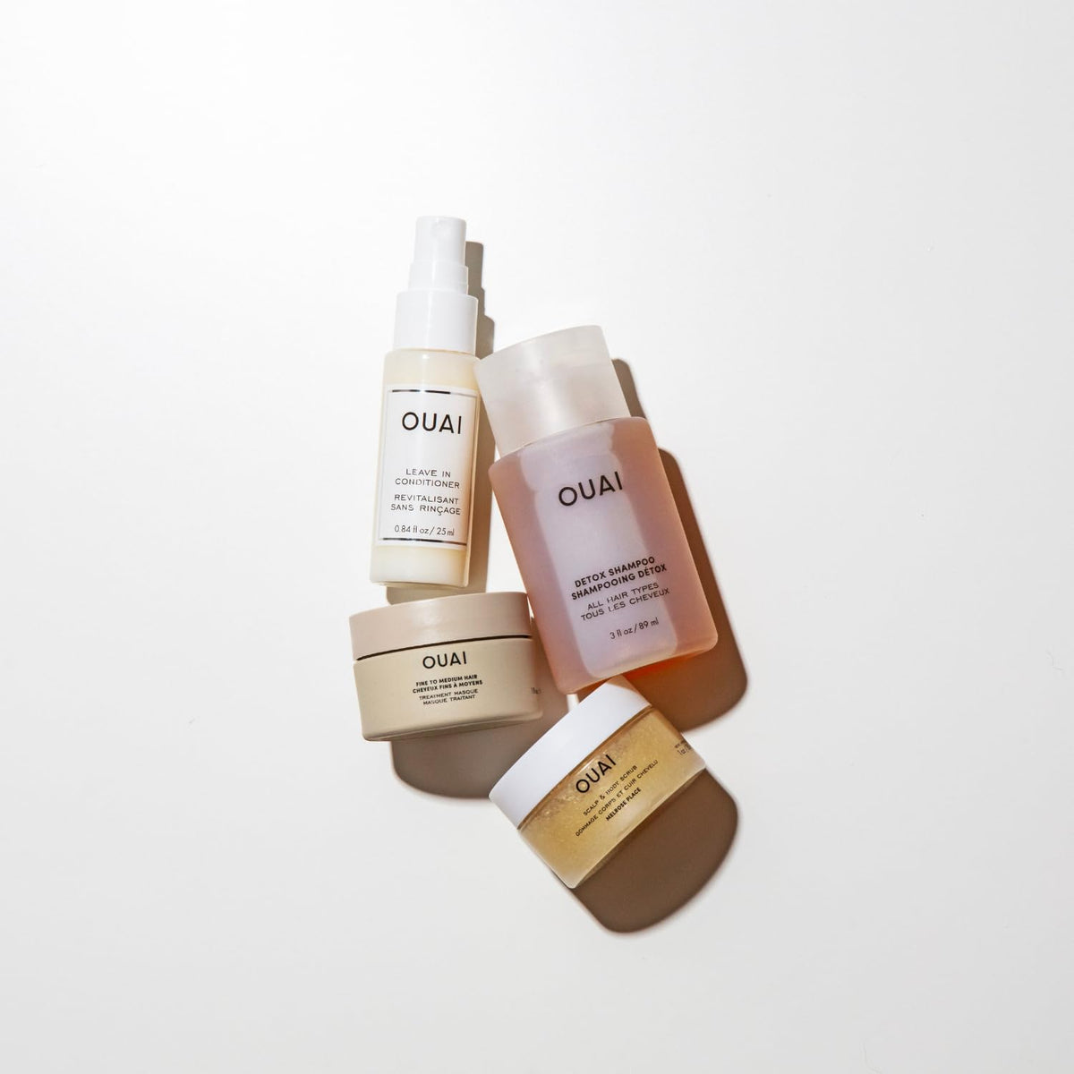 OUAI Travel Kit - Includes Travel Size Leave In Conditioner, Detox Shampoo, Fine to Medium Hair Mask, Scalp & Body Scrub (4 Count) OUAIBuy Supplements Australia